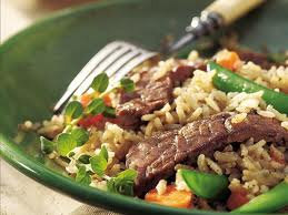 Beef, brown rice, and veggies.